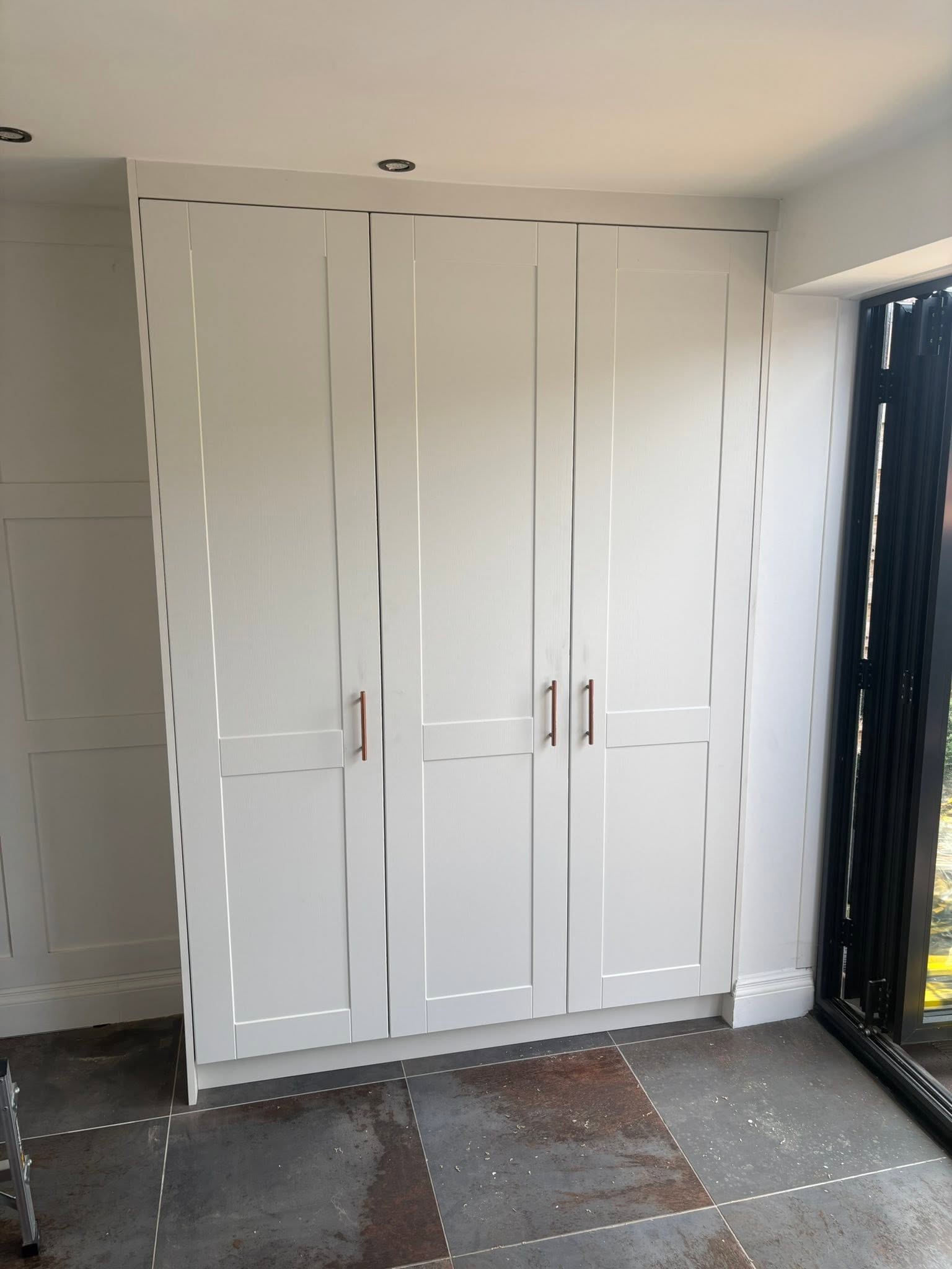 Fitted white wardrobes